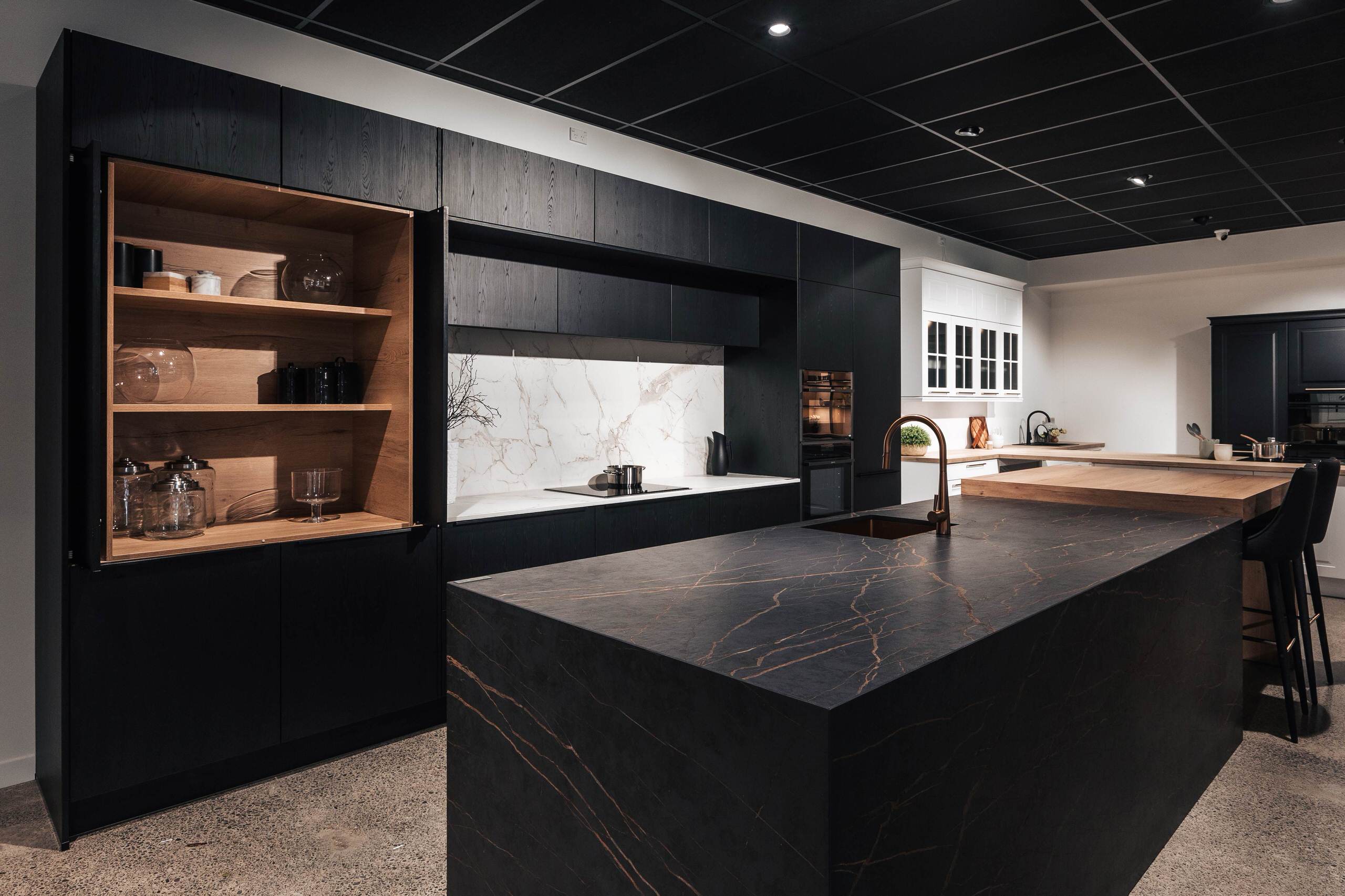 Textured laminate: Nero Oak by Nobilia nicely Paired with Dekton on the bench and island.
