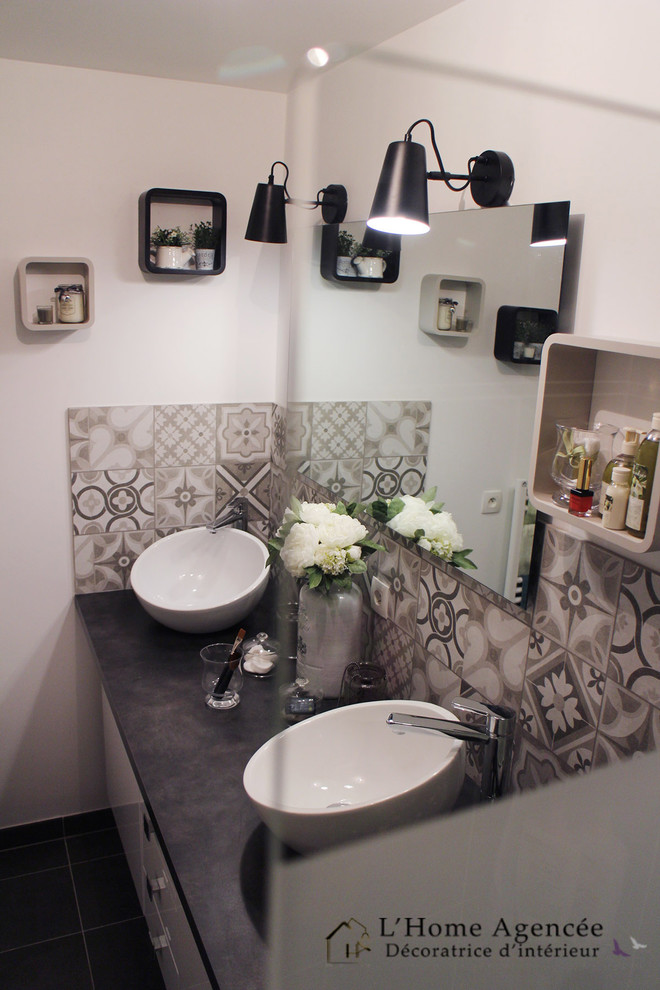 Mid-sized transitional 3/4 bathroom in Paris with an undermount tub, black and white tile, gray tile, cement tile, white walls, ceramic floors, concrete benchtops and a vessel sink.