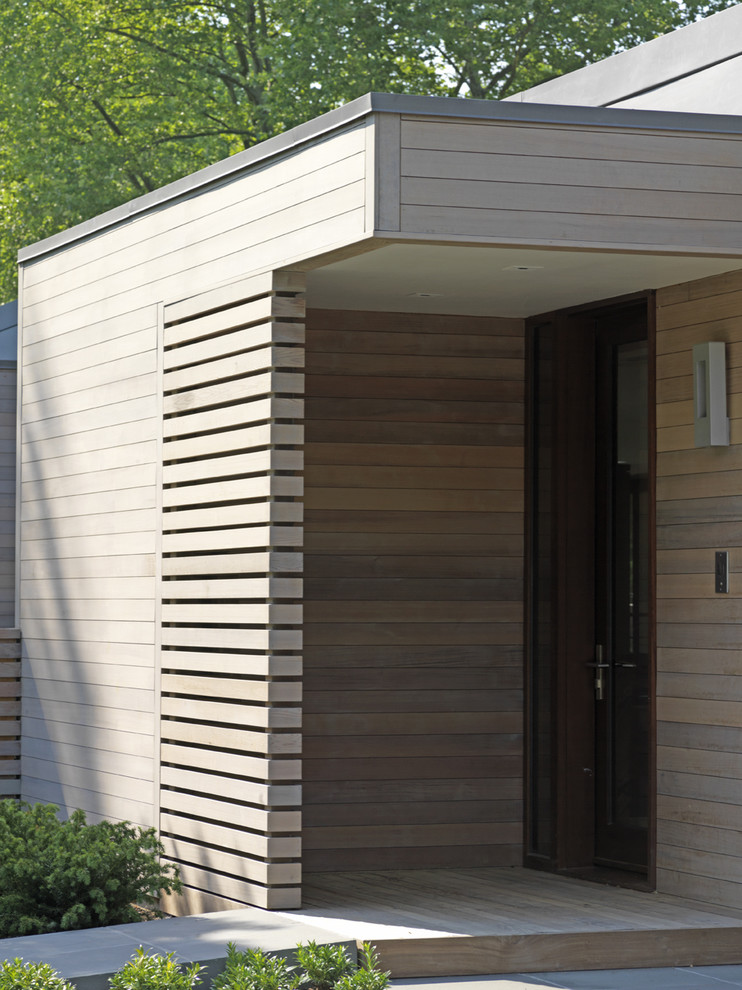 Design ideas for a contemporary exterior in Baltimore with wood siding.