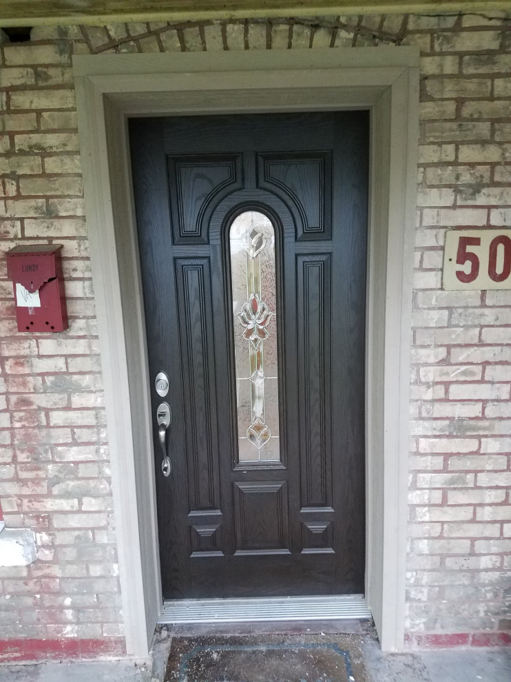 Front door - front door idea with a dark wood front door