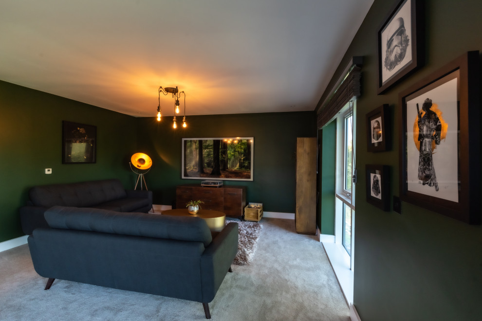Design ideas for a medium sized urban grey and black open plan living room in Kent with a music area, green walls, carpet, a wall mounted tv, grey floors and feature lighting.