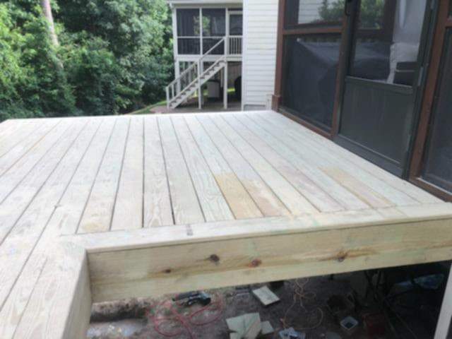 Deck - rustic deck idea in Raleigh