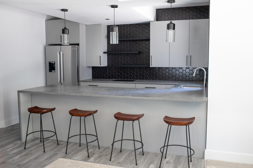 Photo of a midcentury seated home bar in Other with white cabinets, black splashback and grey benchtop.