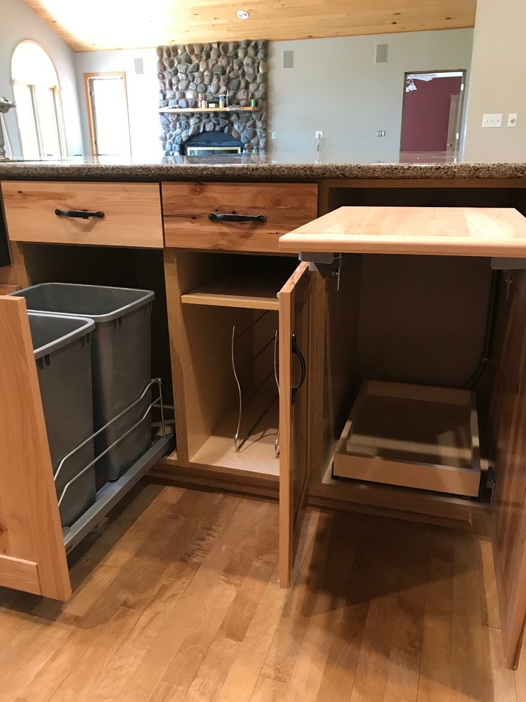 Mid-sized mountain style galley eat-in kitchen photo with an island