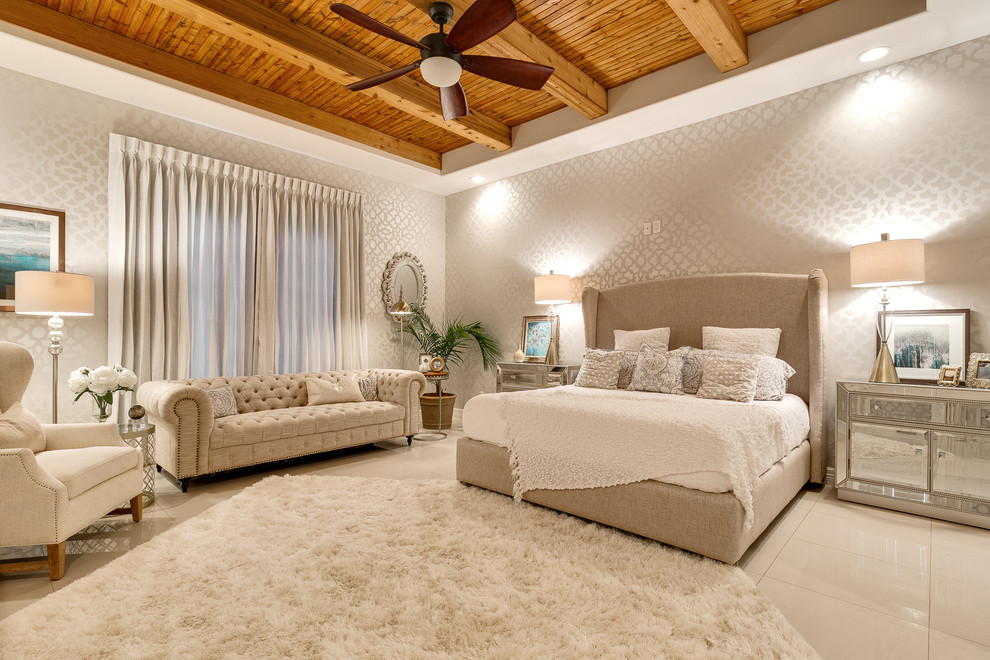 Transitional master bedroom in Other with grey walls and porcelain floors.