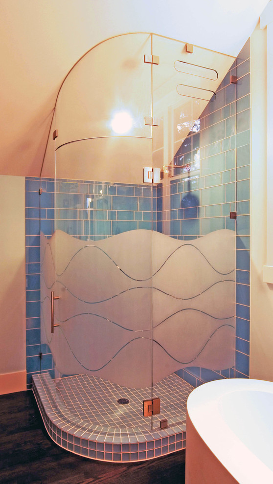 Inspiration for a contemporary bathroom in Seattle with a corner shower and a hinged shower door.