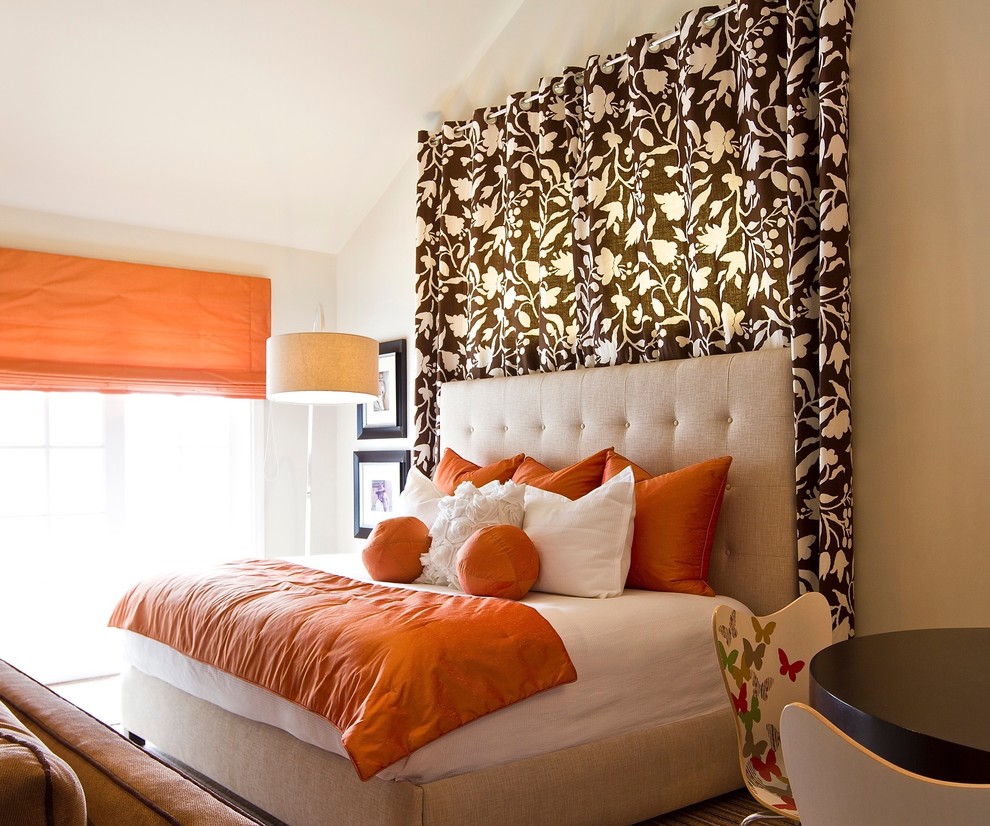 Contemporary bedroom in Orange County with beige walls.