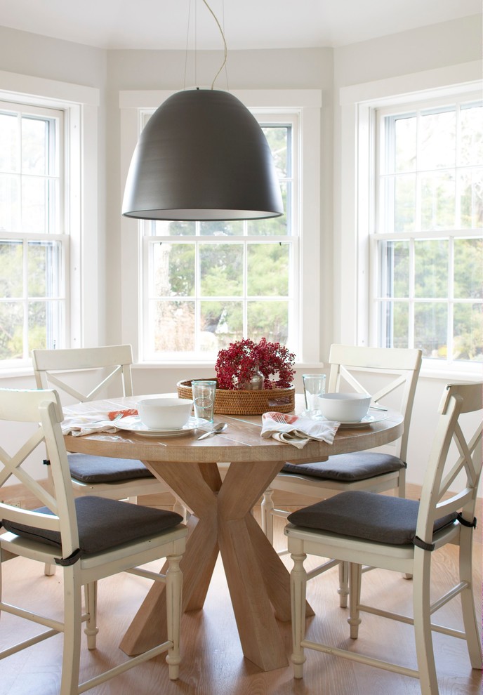 Design ideas for a country dining room in Philadelphia with medium hardwood floors.