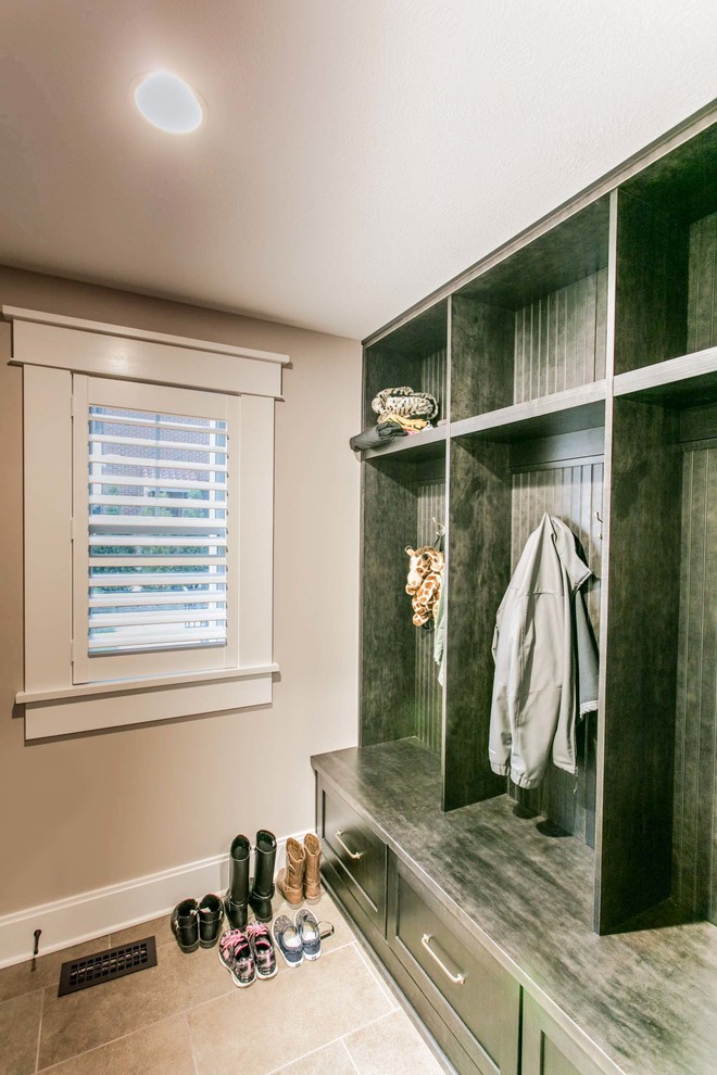 Mudroom - mid-sized craftsman ceramic tile mudroom idea with gray walls