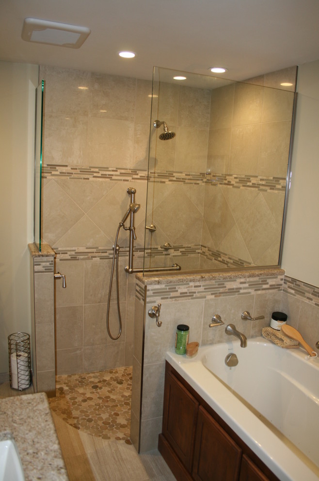 Drop-in bathtub - mid-sized transitional master beige tile and stone tile porcelain tile drop-in bathtub idea in Chicago with flat-panel cabinets, brown cabinets, a one-piece toilet, beige walls, an undermount sink and quartz countertops