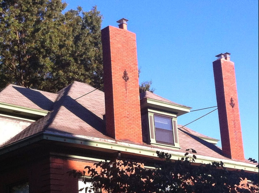 Inspiration for a mid-sized timeless two-story mixed siding exterior home remodel in Kansas City