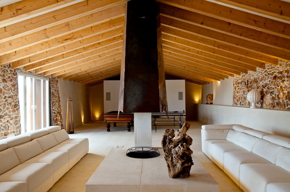 This is an example of a large mediterranean formal open concept living room in Rome with white walls and no tv.