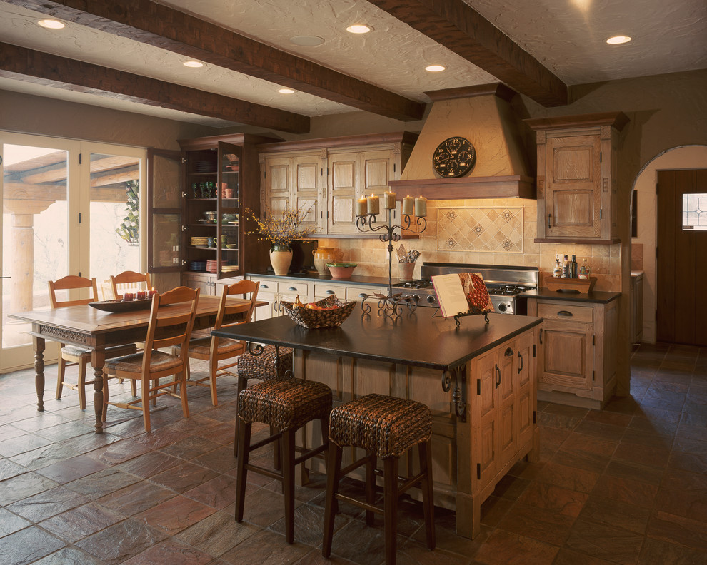 Photo of a traditional kitchen in Denver with beige splashback and with island.