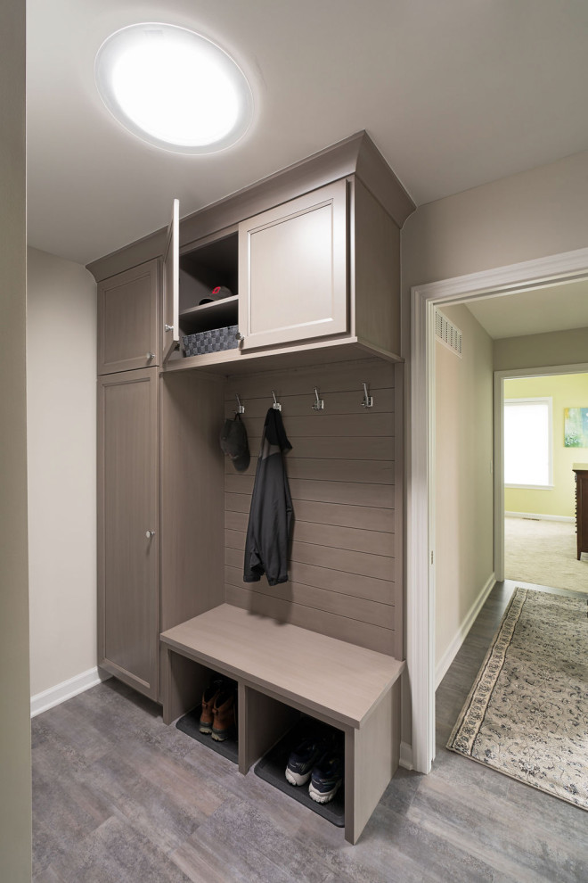 Design ideas for a medium sized classic boot room in Columbus with beige walls, vinyl flooring and grey floors.