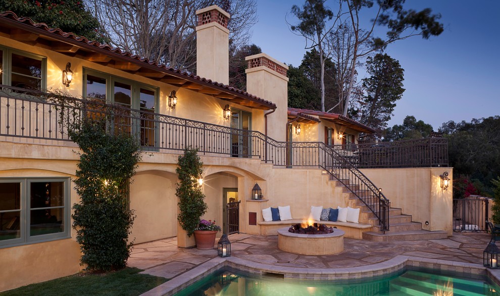 Design ideas for a mediterranean two-storey exterior in Los Angeles.