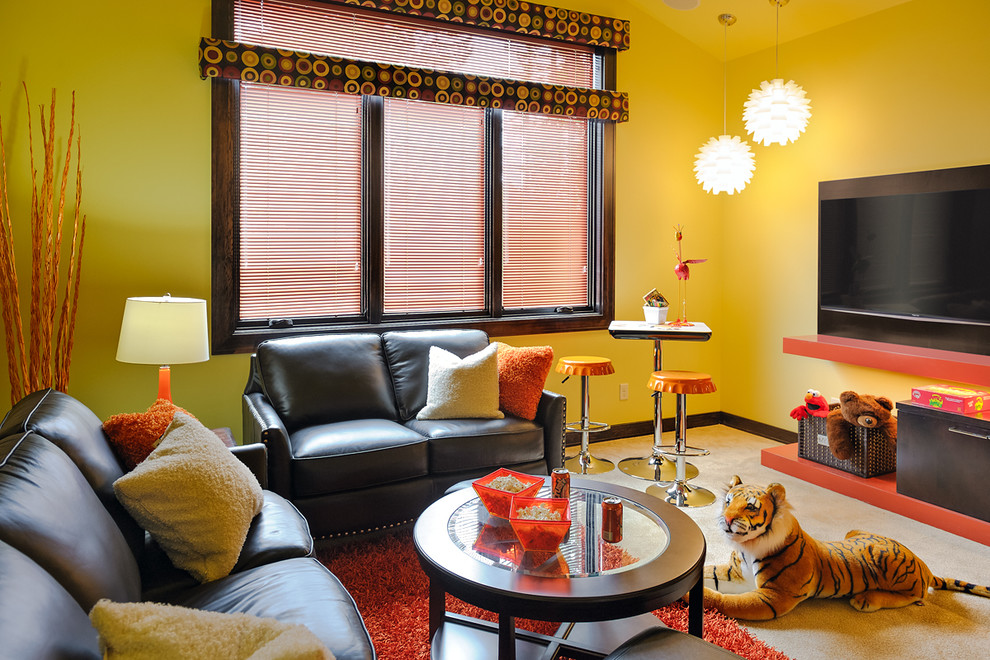 Photo of a mid-sized contemporary gender-neutral kids' playroom in Portland with yellow walls and carpet.