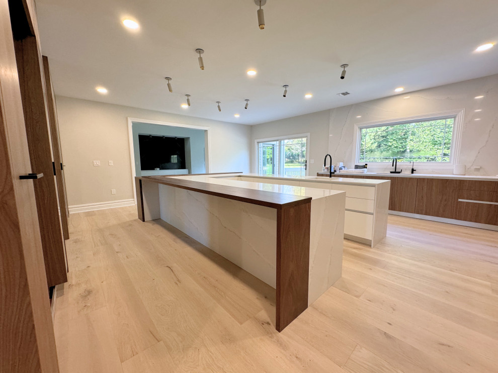 Dual Islands & Pocket Door Kitchen View