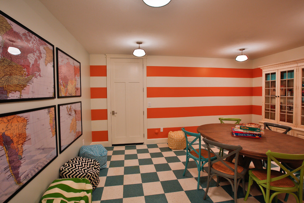 Inspiration for a large transitional gender-neutral kids' room in Salt Lake City with multi-coloured walls.