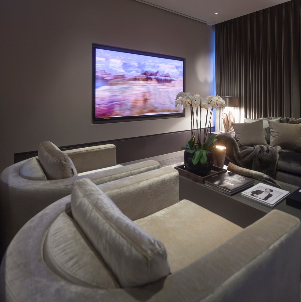 Inspiration for a large contemporary open concept home theatre in West Midlands with grey walls, ceramic floors and a projector screen.