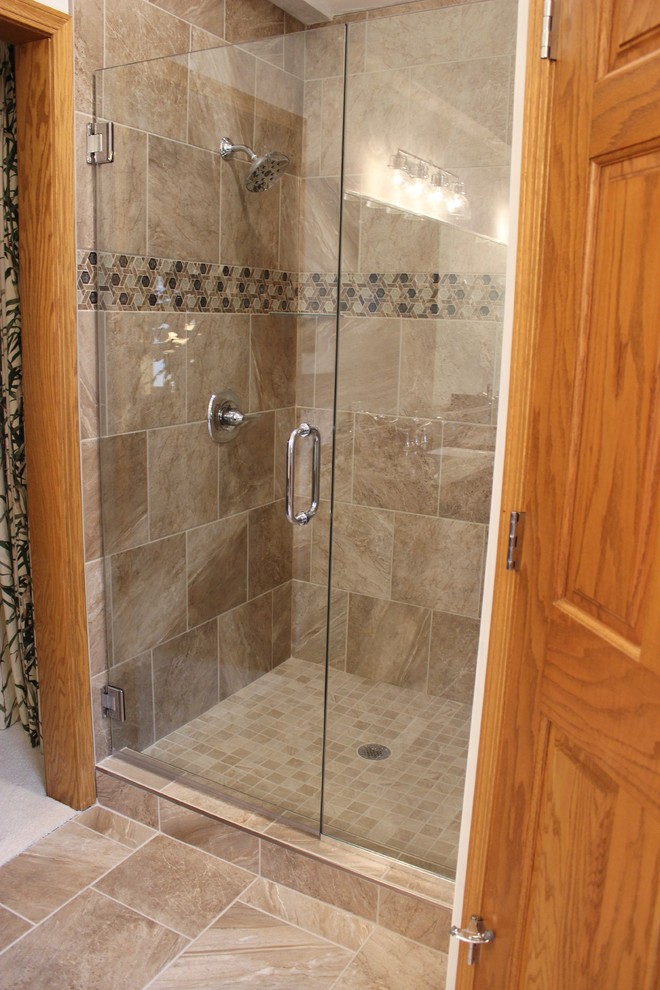 This is an example of a large traditional ensuite bathroom in Other with flat-panel cabinets, grey cabinets, a double shower, beige tiles, a submerged sink, engineered stone worktops, beige floors, a hinged door and multi-coloured worktops.