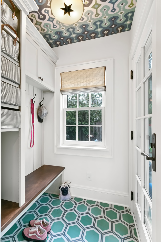 Mid-sized eclectic mudroom in Minneapolis with white walls, a single front door, a glass front door and multi-coloured floor.