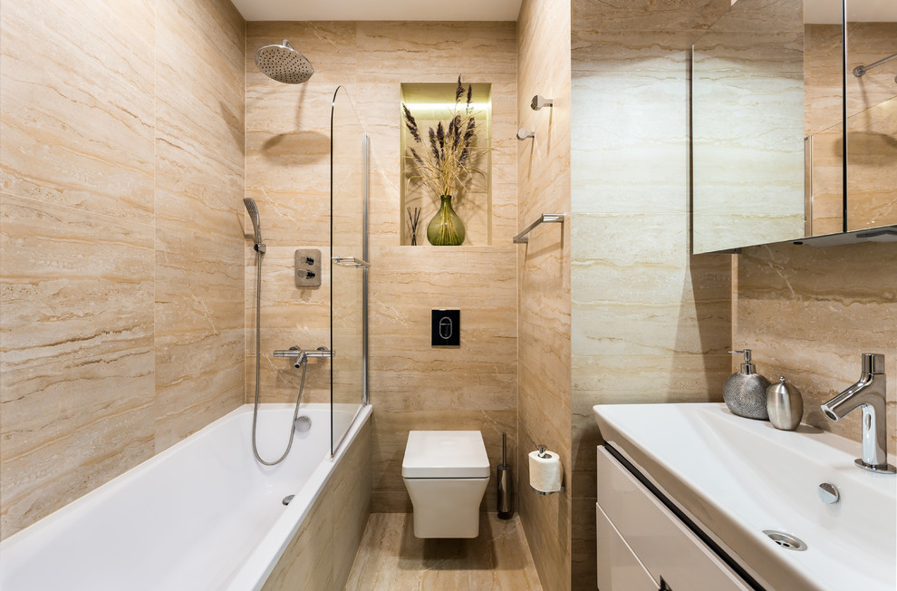 Inspiration for a mid-sized contemporary bathroom in Saint Petersburg with white cabinets, an undermount tub, a wall-mount toilet, beige tile, ceramic tile, beige walls, ceramic floors, a console sink, beige floor and a hinged shower door.