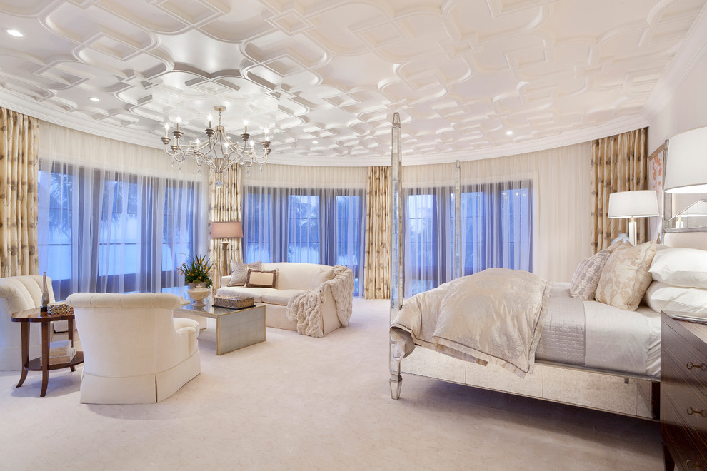 This is an example of a traditional bedroom in Miami with beige walls.