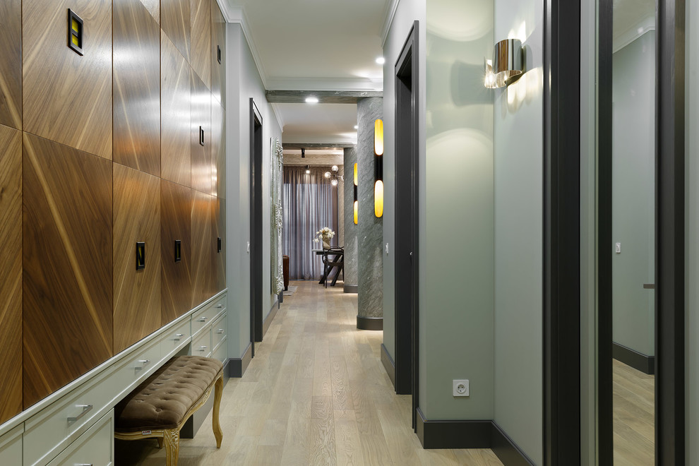 Industrial hallway in Moscow with grey walls and light hardwood floors.