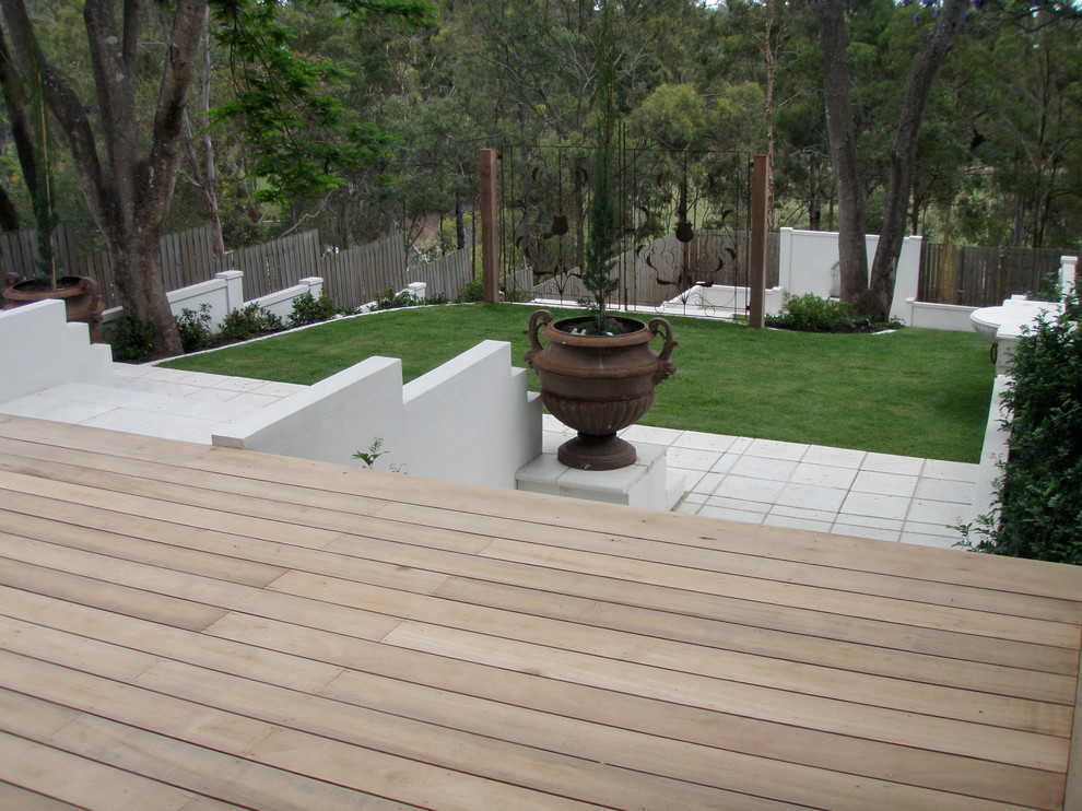 Design ideas for a traditional garden in Brisbane.