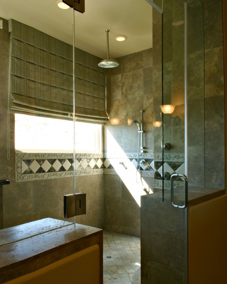 Photo of a mediterranean bathroom in Phoenix with grey cabinets, gray tile, stone tile, beige walls, slate floors, an integrated sink, tile benchtops and with a sauna.