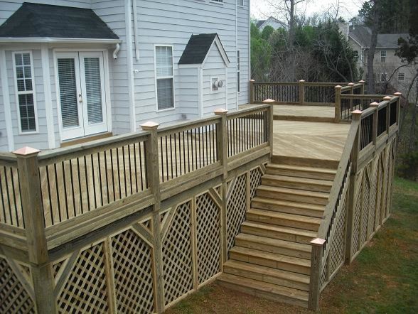 Large elegant backyard deck photo