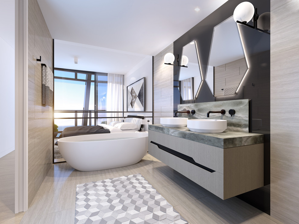 Réalisation d'une salle de bain principale design en bois clair de taille moyenne avec une baignoire indépendante, une vasque, un sol beige, un plan de toilette gris, meuble double vasque et meuble-lavabo suspendu.