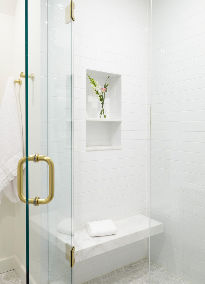 Design ideas for a mid-sized transitional 3/4 bathroom in Toronto with shaker cabinets, grey cabinets, an alcove shower, gray tile, marble, white walls, marble floors, a vessel sink, marble benchtops, grey floor, a hinged shower door and white benchtops.