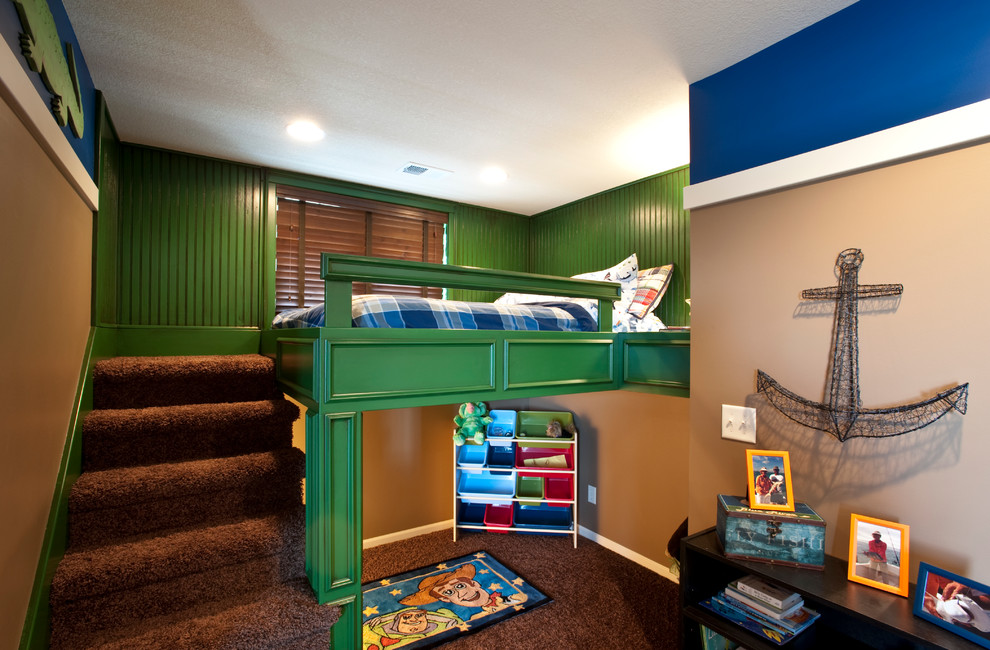 This is an example of a traditional kids' room for boys in Kansas City with multi-coloured walls.