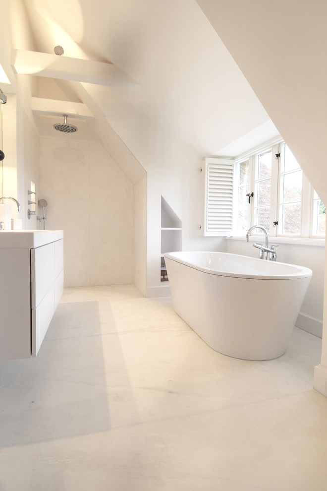 Mid-sized beach style master bathroom in Other with a freestanding tub, marble, marble floors, an undermount sink, marble benchtops, white floor, flat-panel cabinets, white cabinets, an open shower, white tile, white walls and an open shower.