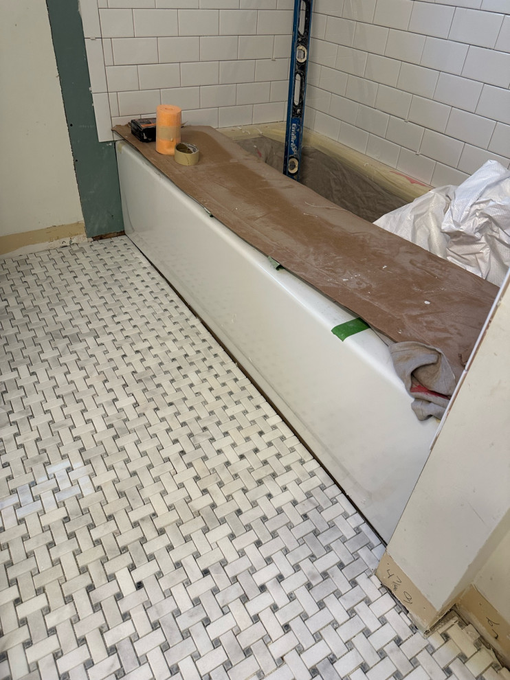 Ideas on hiding gap between tub and floor