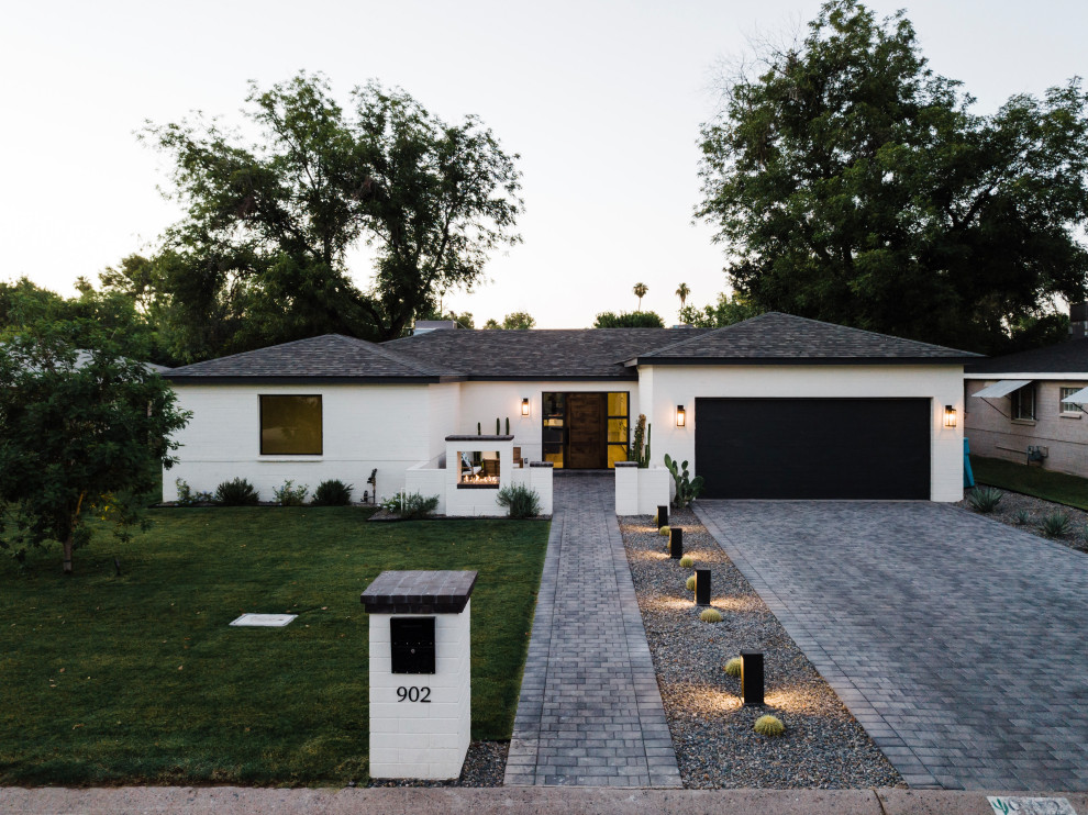 Example of a transitional exterior home design in Phoenix