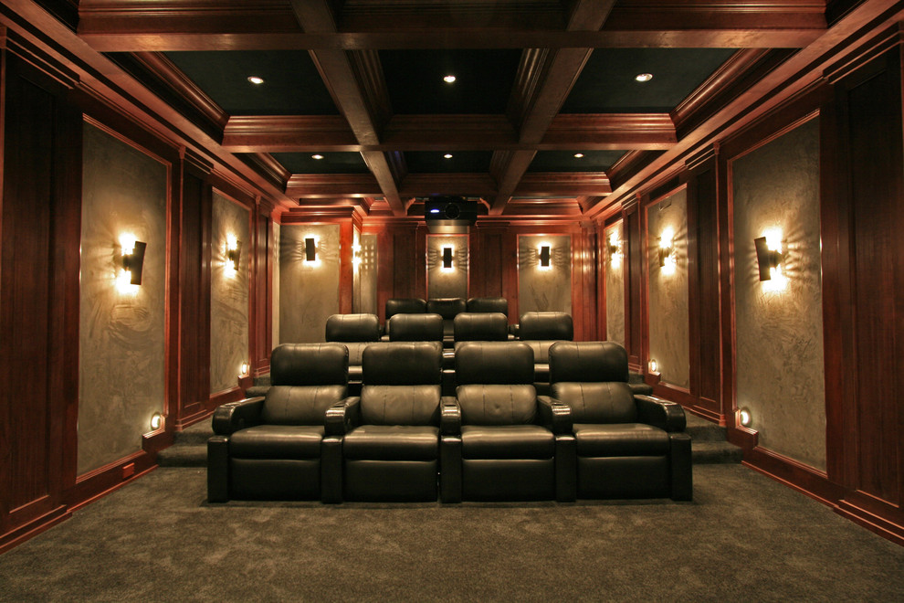 Design ideas for a traditional enclosed home theatre in New York with carpet.