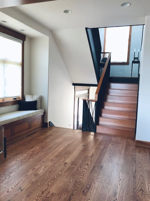 Example of a transitional home design design in Denver