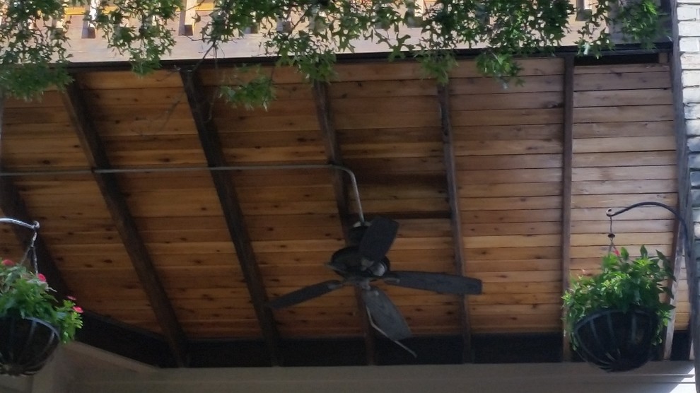 Mid-sized transitional backyard deck photo in Austin with a fire pit and no cover