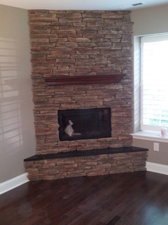 custom corner stone direct fireplace - craftsman - family