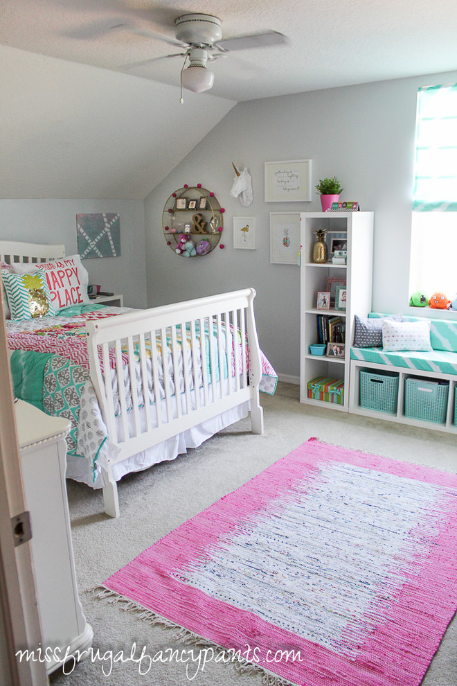 Inspiration for a mid-sized contemporary kids' room for girls in Tampa with grey walls and carpet.