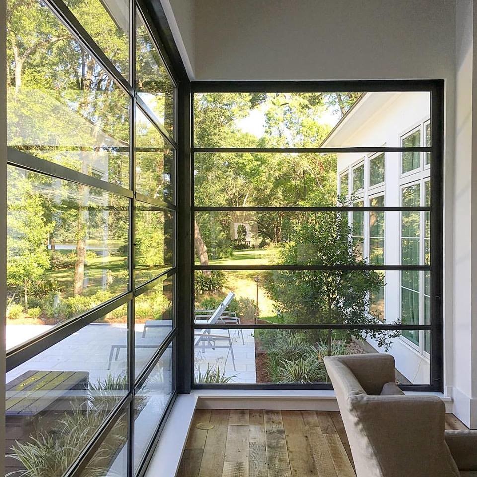 Example of a transitional home design design in New Orleans