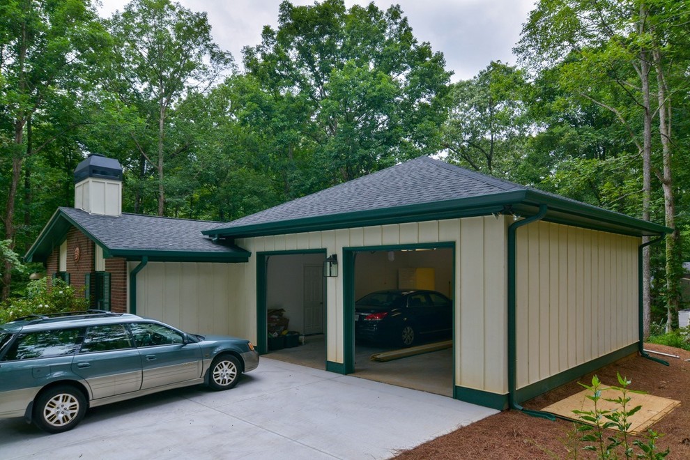 Design ideas for a mid-sized eclectic attached two-car carport in Atlanta.