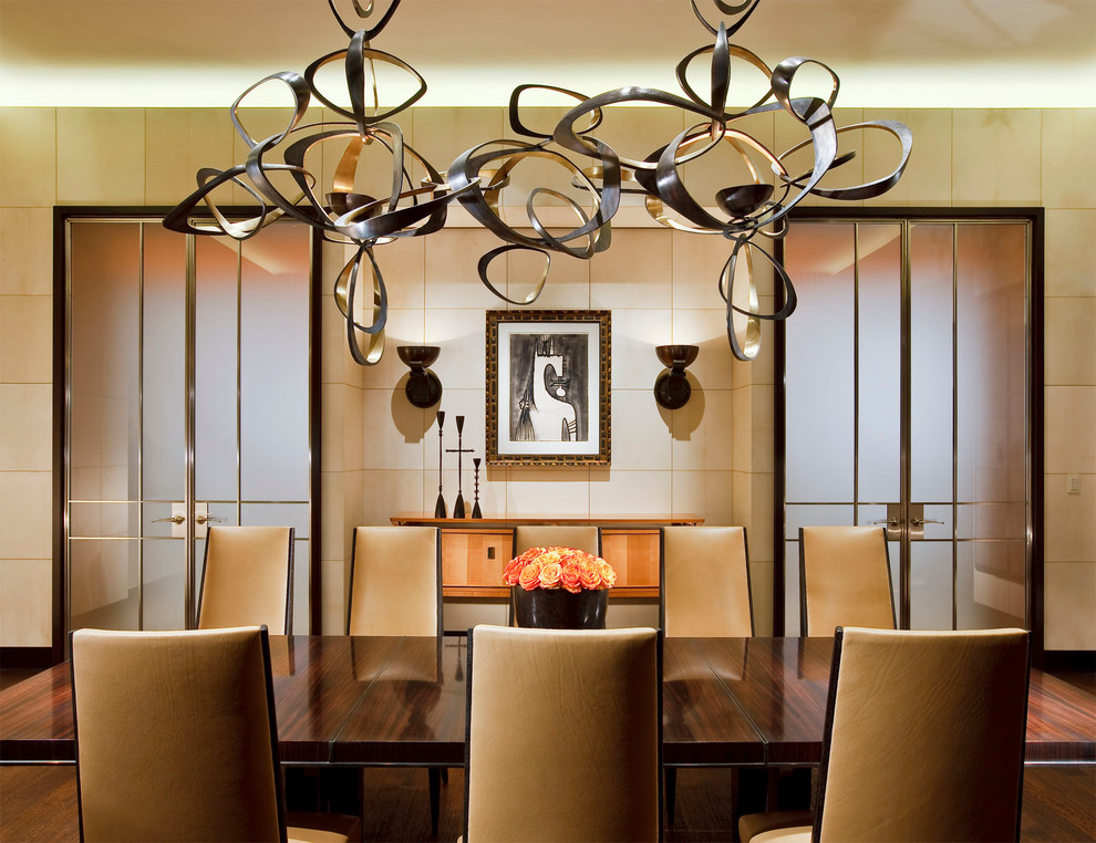 Inspiration for a contemporary dining room in Chicago with dark hardwood floors.
