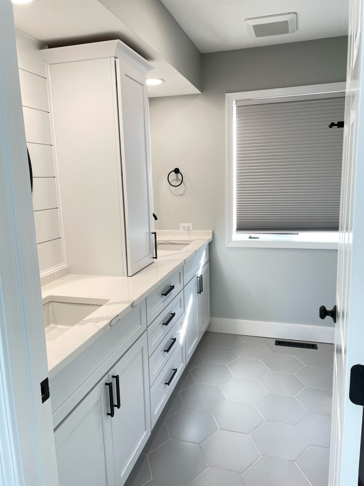 Photo of a medium sized modern family bathroom in Chicago with shaker cabinets, white cabinets, grey walls, porcelain flooring, a submerged sink, engineered stone worktops, grey floors, white worktops, double sinks, a built in vanity unit and tongue and groove walls.