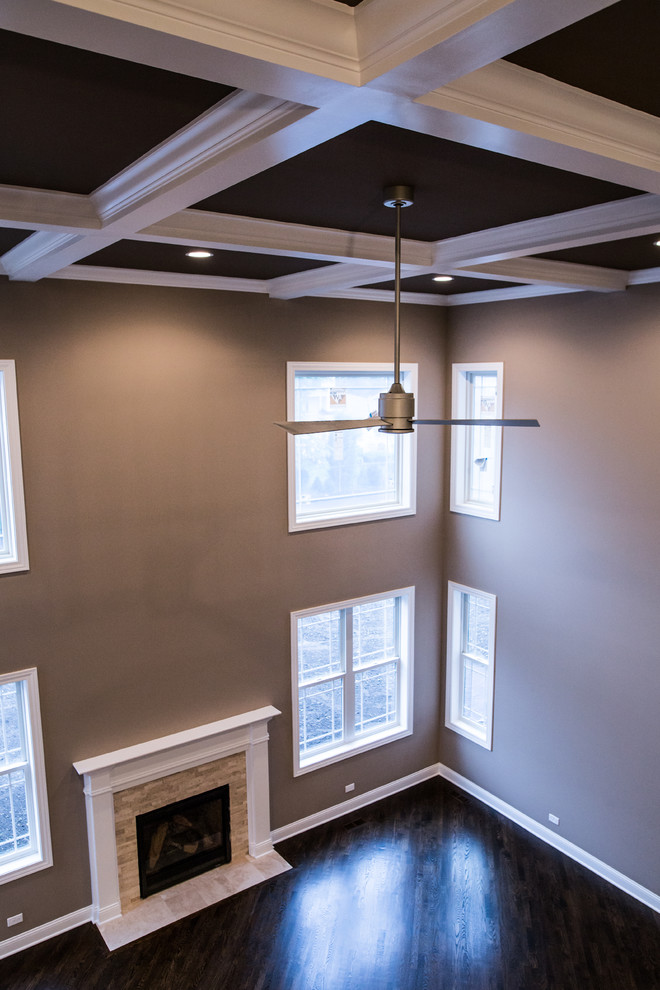 Inspiration for a huge transitional formal and open concept dark wood floor home design remodel in Chicago with brown walls, a standard fireplace, a stone fireplace and no tv