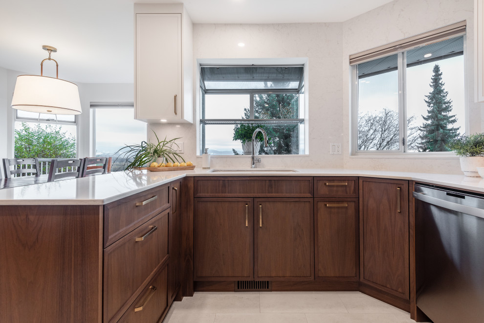 Example of a transitional kitchen design in Vancouver