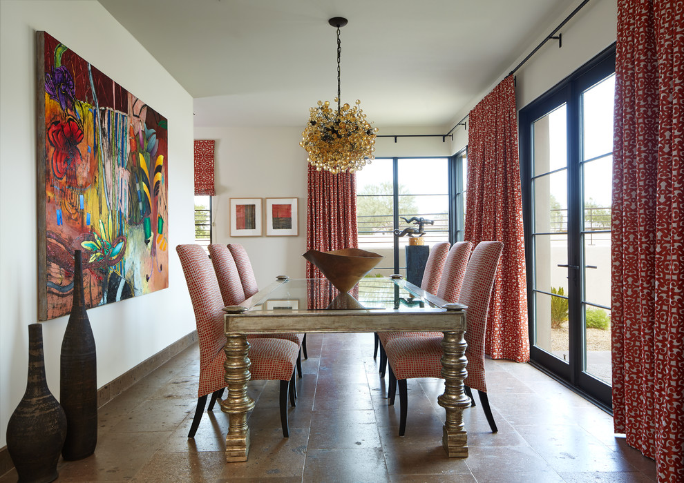 Example of a transitional brown floor dining room design in Phoenix with white walls