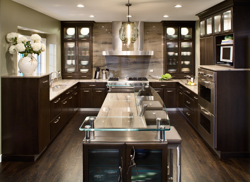 Modern kitchen in Chicago with glass benchtops.